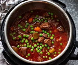 Instant Pot beef stew with carrots, potatoes, and peas
