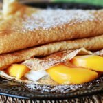 Cinnamon Vanilla Crepes with Fresh Peaches and Cream