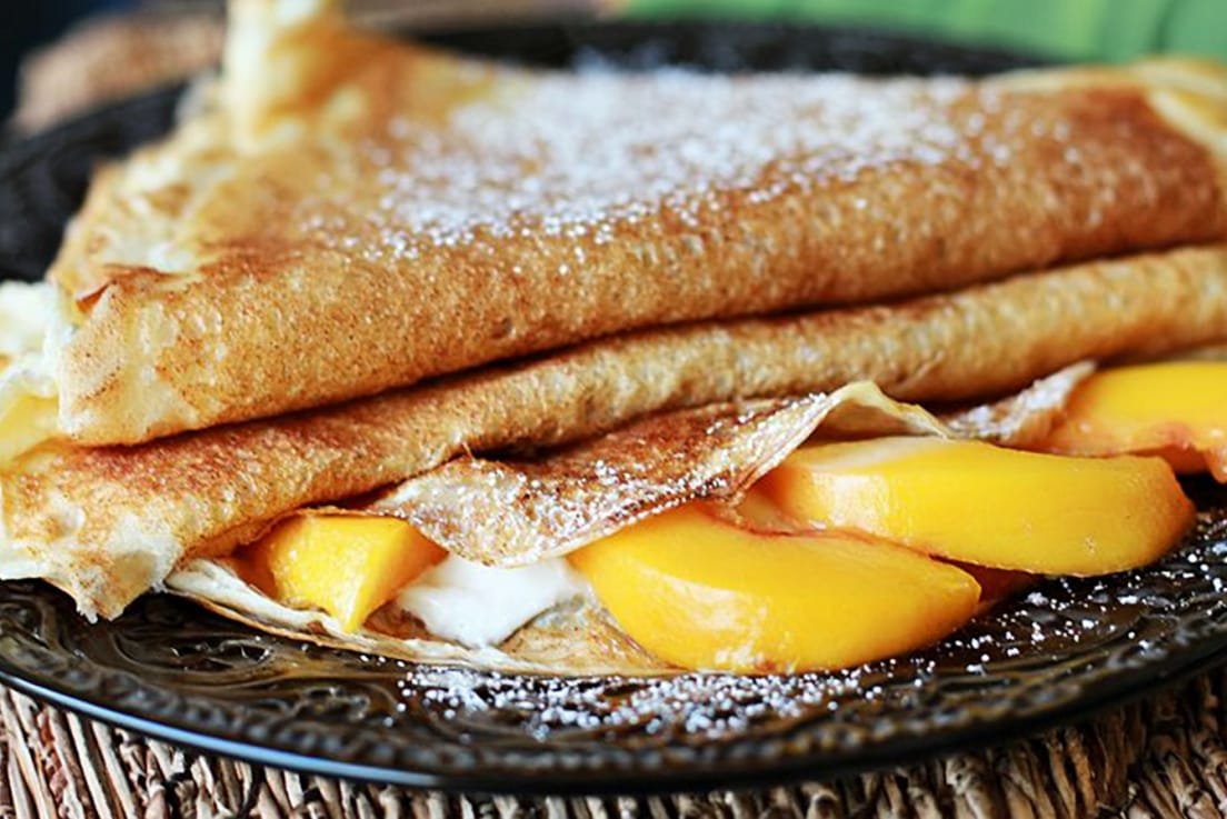 Cinnamon Vanilla Crepes with Fresh Peaches and Cream